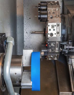 CNC lathe used by HP Manufacturing to machine custom plastic parts & components