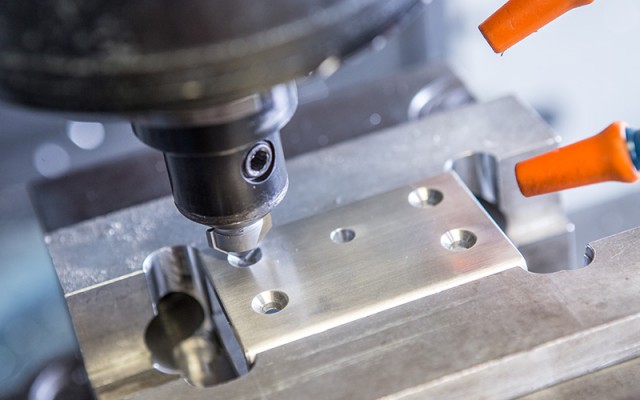 machining metal on Haas machine at HP Manufacturing