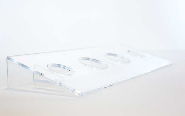 Clear plastic point-of-purchase display manufactured by HP Manufacturing